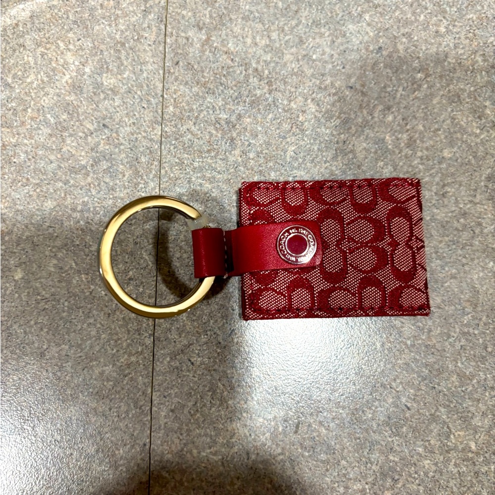 Coach “c” photo album keychain NWT